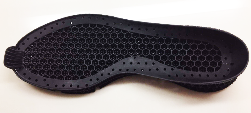 A shoe insole 3D printed with the Loctite IND402 A70 High Rebound resin